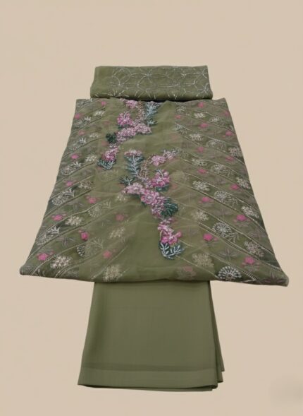 Crimson Saira Shakira Sucha Gota Lime Wedding Collection Embroidered Suit with gold tarkaashi, pink and gold floral embroidery on lime green organza, and a matching embroidered organza dupatta, worn by a female model.