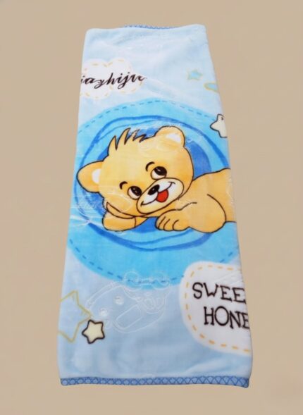 Cute blue baby soft blanket with a cartoon bear illustration, made from plush fleece material.