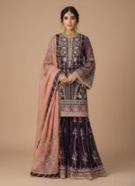 Deep Purple Organza Embroidered Unstitched Suit material featuring heavy silver and pink sequence embroidery on a deep purple fabric, folded neatly with a coordinating pink embroidered dupatta.
