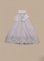 embroidered maxi dress with silver sequins and intricate lace detailing on the hem, accompanied by a matching white dupatta, displayed on a light brown background.