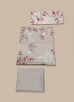 Full-length image of a woman wearing a beige Floral Embroidered Woolen Suit with red and pink floral patterns. The suit is unstitched, featuring a long shirt, trousers, and a dupatta, all made of warm wool fabric.