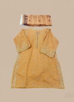 Overhead flat lay of a mustard embroidered cotton kurta and a folded printed dupatta.