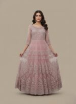 Elegant pink maxi dress with silver embroidery and sequin details, suitable for formal events and parties.