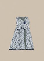 A flat lay showing a white and blue floral printed khaddar Angrakha style kurta with blue floral and vine designs, dark blue lace trim, a tassel, and a folded plain dark blue khaddar dupatta.