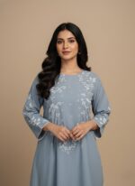 Handmade painted blue cotton kurta for women with white embroidered floral design. 2-piece ethnic wear "sweater" with hand-stitched details.