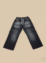 Kids black cargo jeans with white drawstring waist and wide legs, featuring a washed black denim look and two side cargo pockets, displayed on a neutral background.
