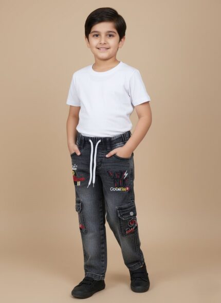 Kids black cargo jeans with colorful embroidery, white drawstring, and side pockets on a plain background.