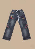 Kids black cargo jeans with colorful embroidery, white drawstring, and side pockets on a plain background.