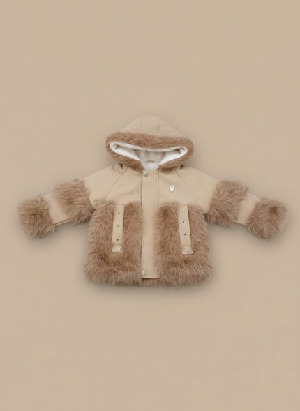 Front view of a young child wearing a beige Kids Faux Fur Trim Jacket with a hood, featuring fluffy brown faux fur on the sleeves, front pockets, and hood lining, against a plain background.