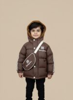 Front view of a young child wearing a brown Baliagaenc Kids' Puffer Jacket with white sleeve stripes, a "BB" logo, a brown hood, and a matching Baliagaenc crossbody bag.