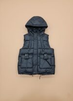 Front view of a NASABASE Kids' Superhero Sweatshirt with an Ultraman graphic, navy raglan sleeves, and maroon collar, modeled by a smiling young boy.