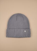 Image of a grey ribbed beanie with a silver interlocking C logo emblem on the folded cuff.