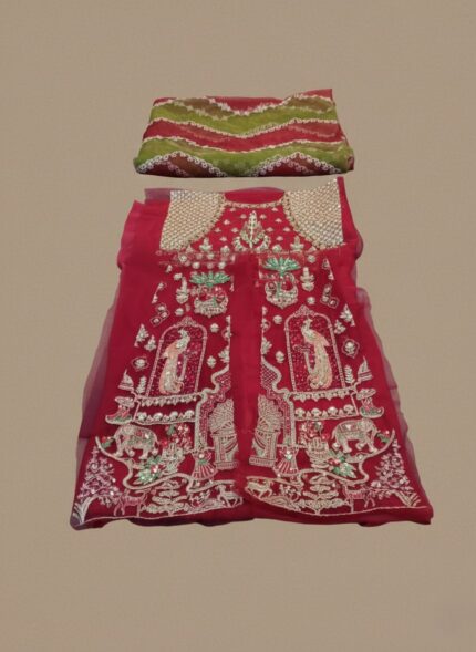 Close-up of a red hand embellished net bridal outfit with heavy silver and gold embroidery, paired with a vibrant green and red striped organza dupatta. Includes embroidered bodice, panels on net, cotton inner, and raw silk trouser.