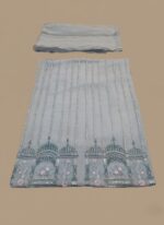 Light Blue Embroidered Net Dress material with silver vertical lines and intricate teal, pink, and gold floral and dome embroidery along the border. Includes the matching heavily embroidered net dupatta.