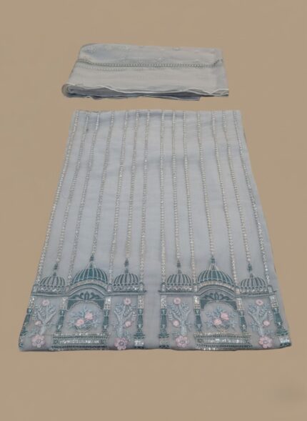 Light Blue Embroidered Net Dress material with silver vertical lines and intricate teal, pink, and gold floral and dome embroidery along the border. Includes the matching heavily embroidered net dupatta.