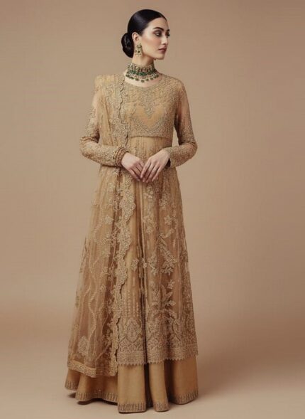 Pale yellow embroidered net sharara suit fabric laid flat, showing the heavily embellished shirt panels and borders for a formal Pakistani/Indian outfit.