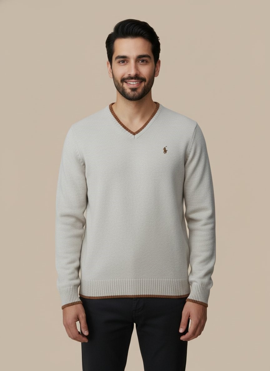 Men's Beige V-Neck Sweater Men's beige V-neck sweater with brown striped trim on the collar, cuffs, and hem, worn by a model.
