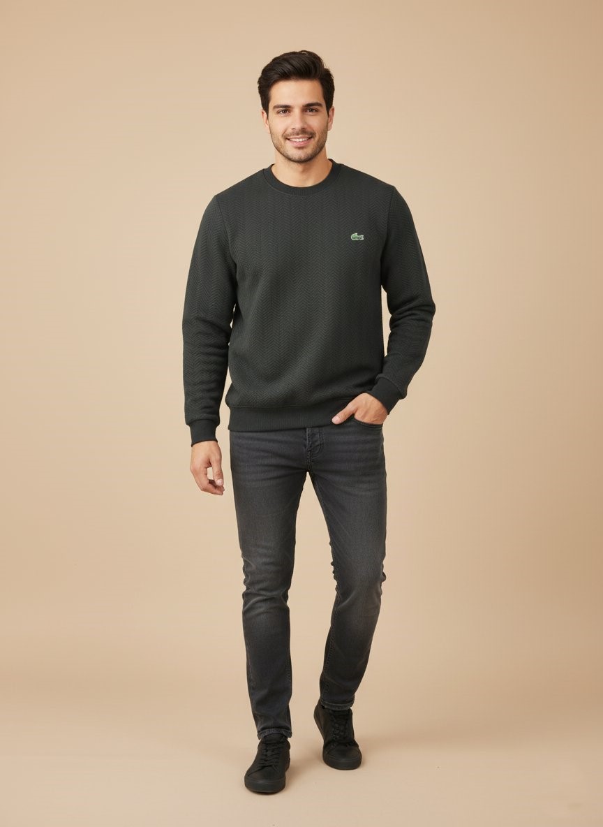Men's Dark Grey Textured Crew Neck Sweater Men's dark grey textured crew neck sweater with a subtle chevron pattern, worn by a model, showcasing its fit and sophisticated dark grey color.