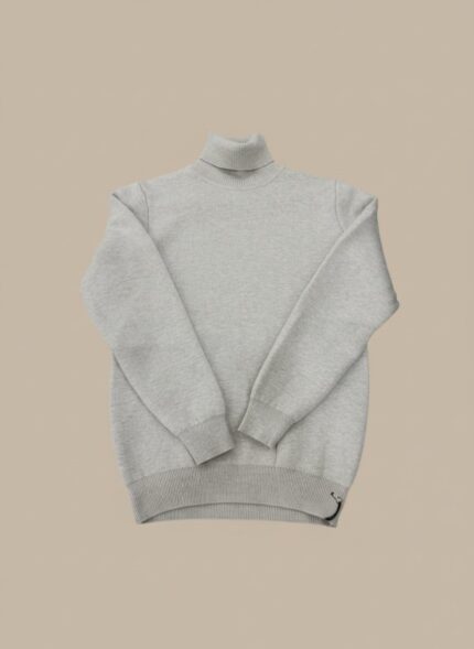 Men's light grey ribbed knit turtleneck sweater, shown on a man.