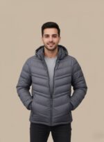 Men's grey lightweight hooded puffer jacket with full zip closure and quilted design.