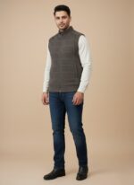Dark grey men's padded vest with a full zipper, high collar, ribbed bottom hem, and horizontal stitching.