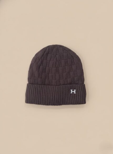 Men's dark ribbed knit beanie with white 'H' logo embroidery
