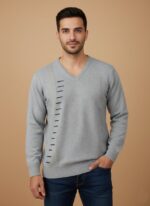 Men's Grey V-Neck Sweater with vertical blue stripe details, worn by a man with dark hair, posing against a light brown background.