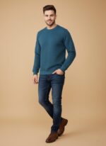 Men's teal textured crew neck sweater with a diamond-like pattern, displayed on a model, highlighting the vibrant color and soft material.