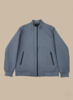 Men's slate blue waffle knit zip-up bomber jacket with ribbed collar, cuffs, and hem, and two zippered side pockets.