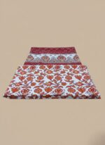 Palwasha floral print 3 PC unstitched lawn fabric suit on a wooden table, showcasing the intricate patterns of the shirt and dupatta pieces, with a product box in the background.