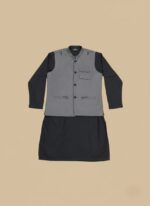 Child wearing a black boys kurta waistcoat set with a grey waistcoat, along with a flat-lay of the complete outfit.