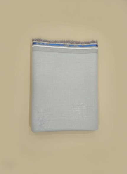 Premium grey fabric roll with a striped edge, high-quality textile for tailoring.