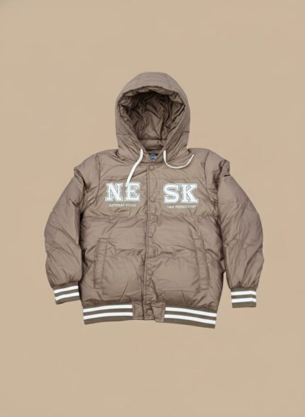 Tan hooded puffer jacket for boys with white "NE SK" lettering on the front, ribbed striped cuffs, and a button closure.