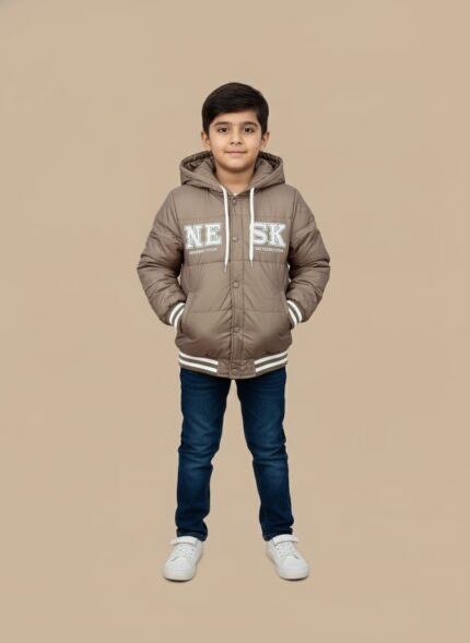 Tan hooded puffer jacket for boys with white "NE SK" lettering on the front, ribbed striped cuffs, and a button closure.
