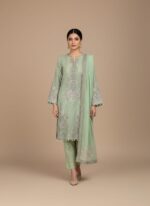Heavily embroidered lime green unstitched chiffon shirt with elaborate traditional embroidery on the neckline, sleeves, and hem, representing a formal chiffon embroidered dress fabric.