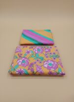 3 PC unstitched lawn fabric with floral and striped patterns on an orange background,