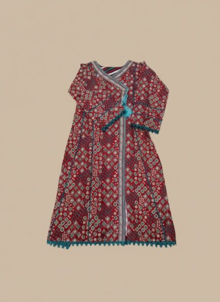 A flat lay showing a maroon and teal geometric printed khaddar Angrakha style kurta with a decorative teal tassel, teal lace trim, and a folded plain teal khaddar dupatta.
