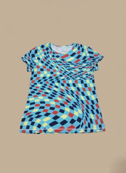 Girls' wavy checkerboard dress with blue, red, and yellow squares in a distorted pattern, front view.
