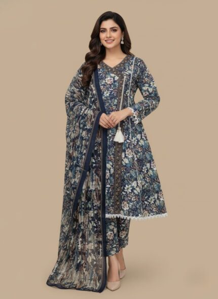 Full-length image of a woman wearing a navy blue Women's Floral Suit with an all-over floral printed long-sleeve tunic featuring lace trim and a tassel, matching patterned trousers, and a printed dupatta.