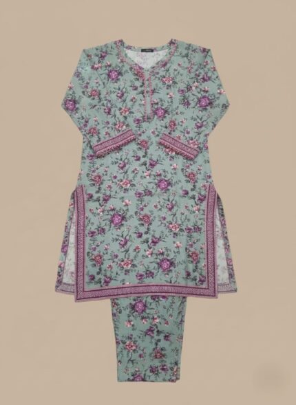 Half-length image of a woman wearing a light green Women's Floral Tunic with an all-over purple floral print, an embroidered V-neckline, and long sleeves with patterned cuffs.