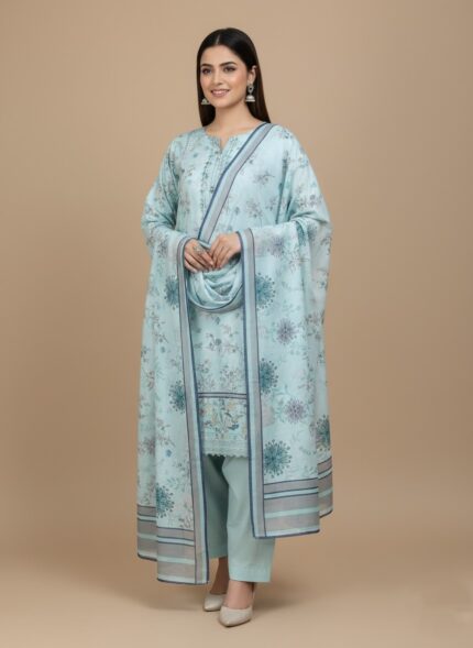 Model wearing a tailored blue floral embroidered wool unstitched suit with dupatta and trousers, ready for winter.