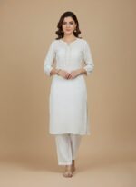 Folded white uniform pants with an elastic waistband, suitable for professional workwear.