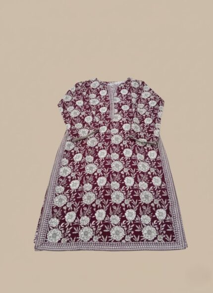 A stunning maroon khaddar printed suit for women, featuring elegant white floral patterns.