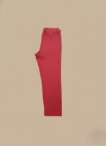 Folded red leggings made from soft cotton, ideal for women seeking comfortable and stylish everyday wear.