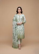 Model wearing Zara Meer Spring Digital Printed Karandi 3-piece suit Design 04 featuring a fresh green and white floral pattern