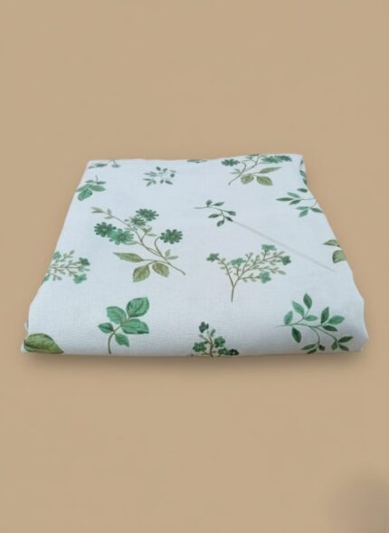 Close-up of the intricate green floral digital print on the Rice Karandi fabric from the Zara Meer Spring Digital Printed Karandi collection