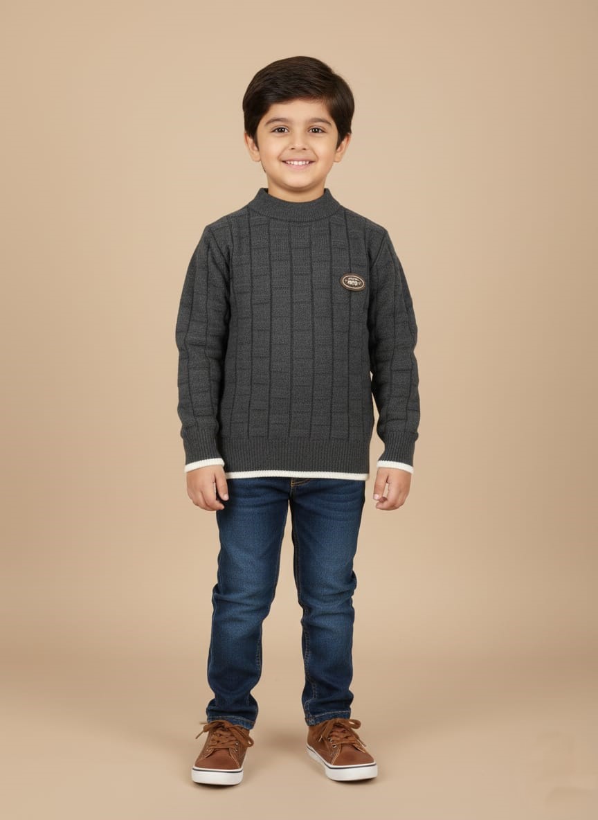 Stylish Boys Knit Sweater - Charcoal Grey Mock Neck with Textured Design Happy boy in a charcoal grey mock neck knit sweater, layered white t-shirt, blue jeans, and brown lace-up shoes, smiling at the camera.