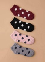 Four pairs of super-soft, ankle-length Fuzzy Polka Dot Socks arranged vertically; colors include maroon, black, light pink, and grey.