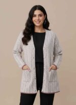 Women's light pink rabbit wool sweater with button front and pockets Off-white stitched winter cardigan for women by Gelani's Close up of embossed knit pattern on black rabbit wool sweater Skin colored free size winter sweater for women Pakistan Gelani's premium rabbit wool sweater in light skin shade front view Rabbit wool sweater