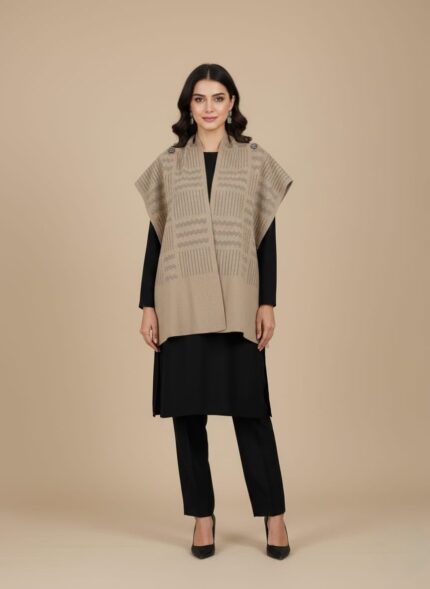 Beige women sweater shawl worn over black dress, sleeveless knit wrap for winter layering.